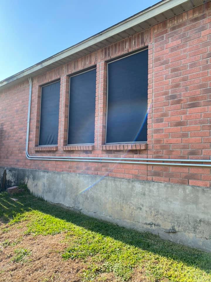 Solar screens on modern home